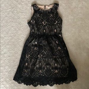 Eva Mendes black lace overlay dress